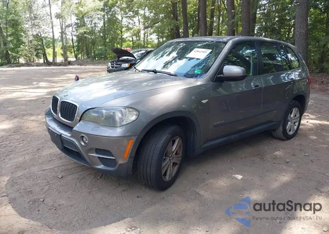 2011 BMW X5 xDrive35I z USA, uszkodzony, nr VIN 5UXZV4C55BL405830